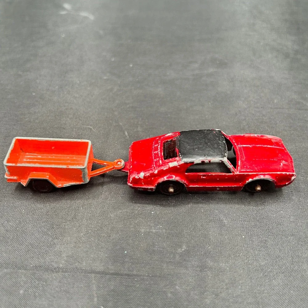 Vintage Tootsietoy Red Oldsmobile Toronado Diecast Car with UHaul Trailer USA